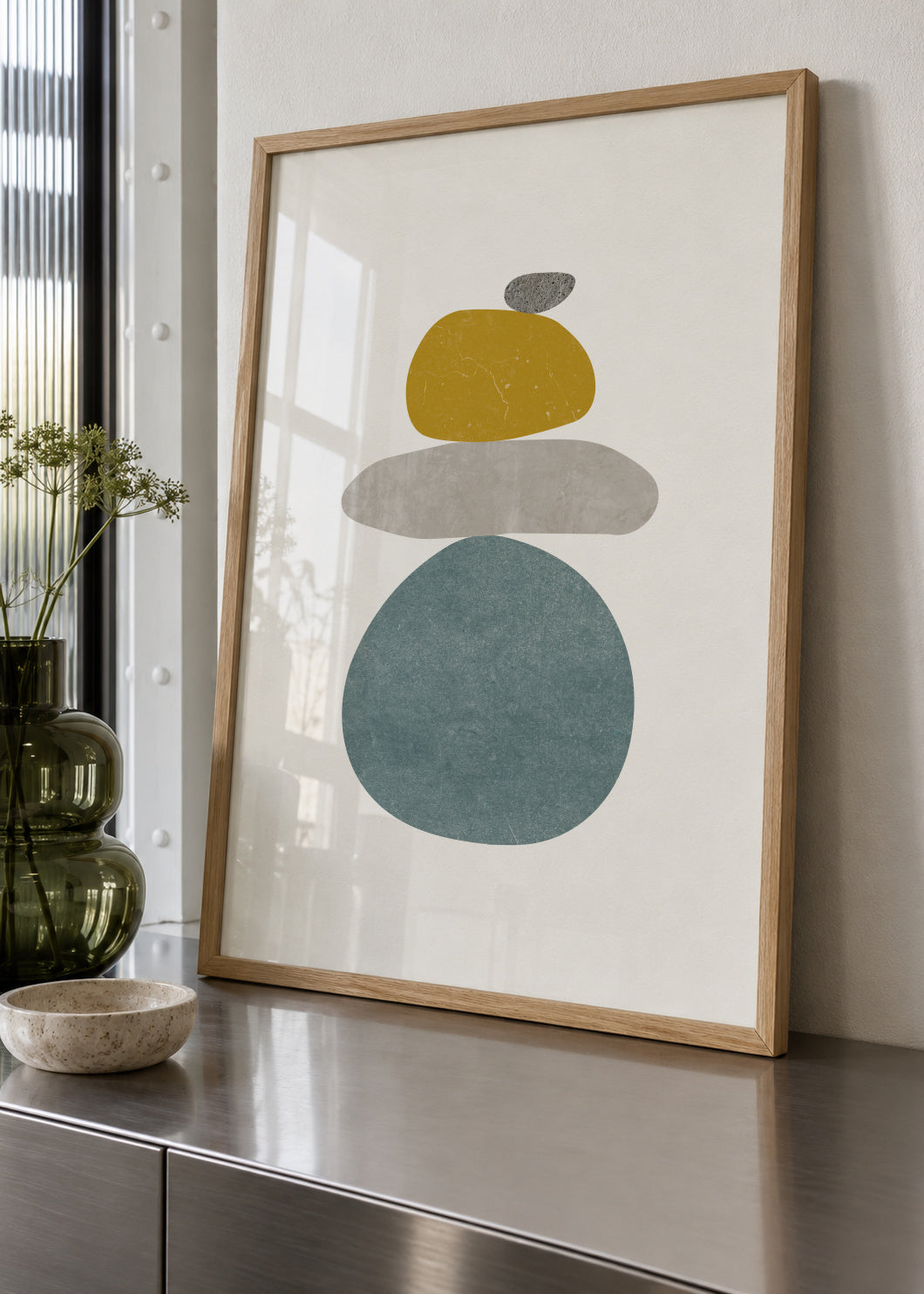 Pebbles N 5 - Framed poster in an interior