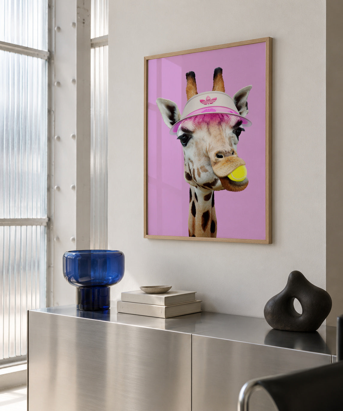 Tennis Giraffe - Framed poster in an interior