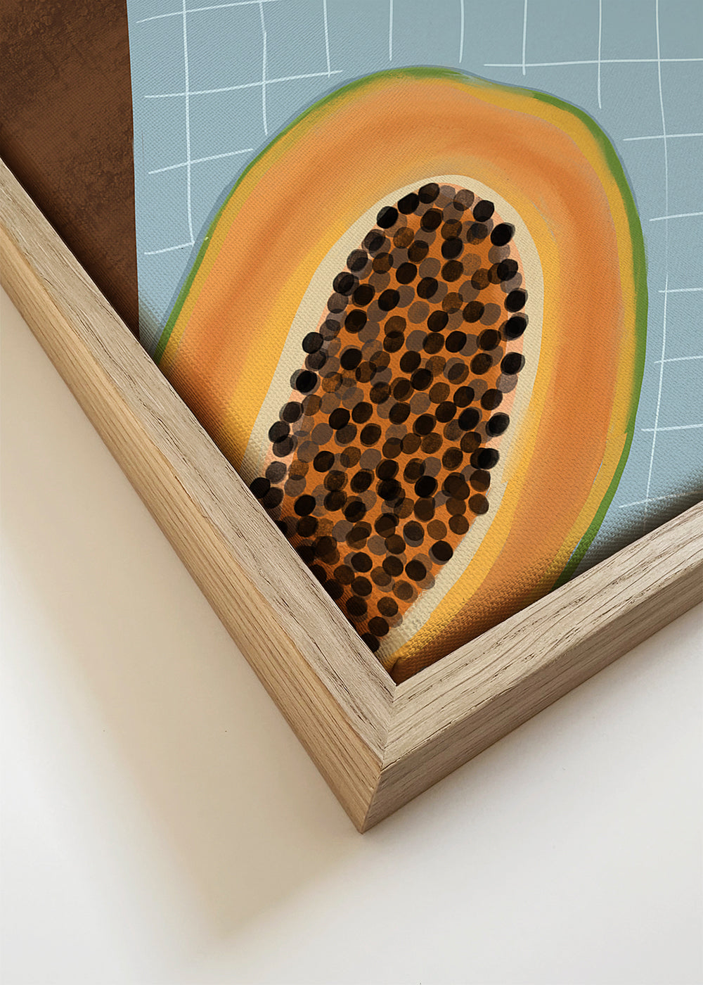 Keuken kunst: gehalveerde papaja op ruitendoek
