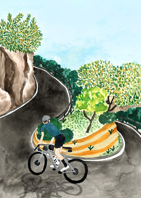 Landschapskunst met fietser in bergbocht