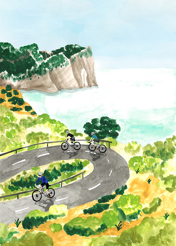 Sportkunst met fietsers aan de kust