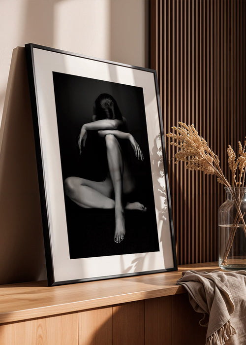 Fotografie van zittend figuur in studio