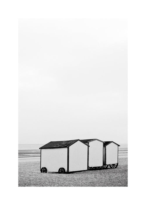 Landschapsprent zwart-wit met strandhuisjes
