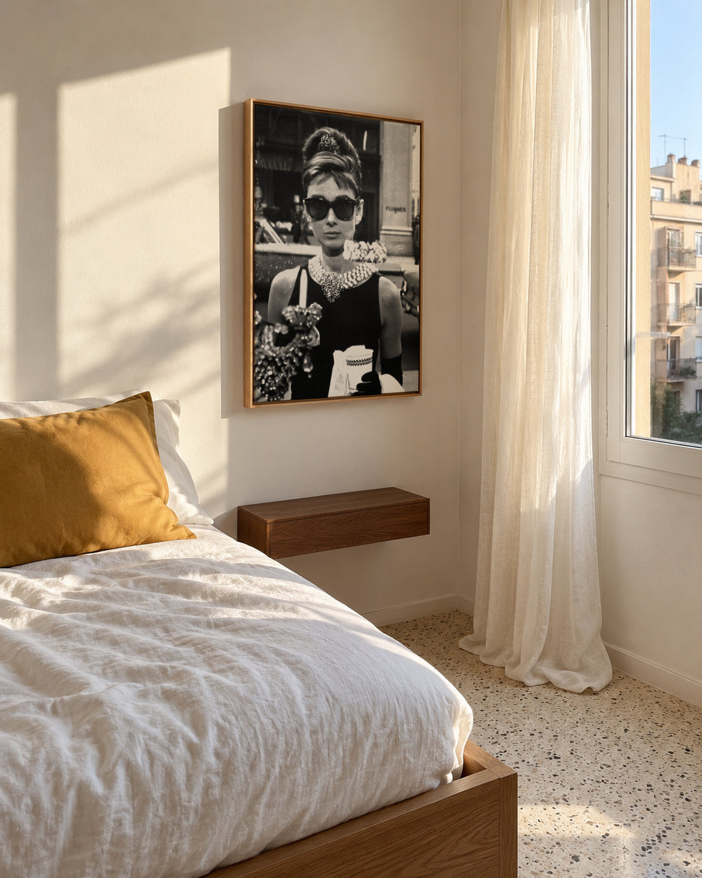 Audrey Hepburn in Breakfast at Tiffany vintage photograph. - Framed canvas in an interior