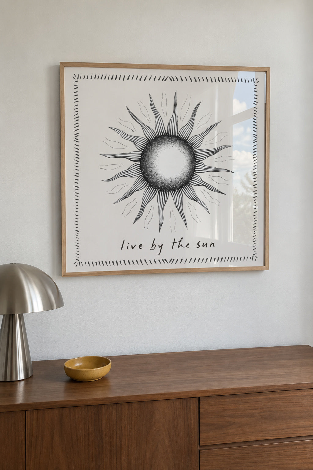 Live by the sun - SQUARE - Framed poster in an interior