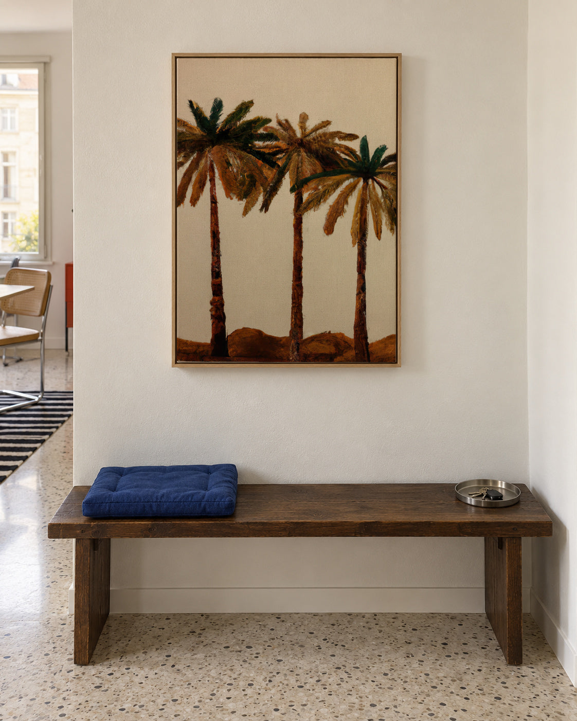 Palm trio - Framed canvas in an interior