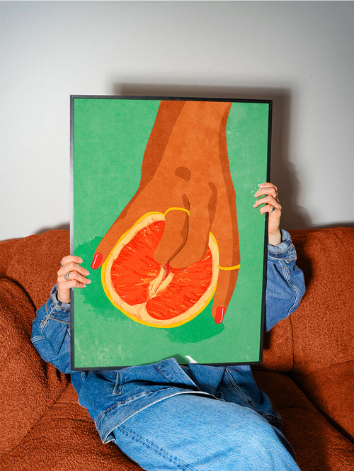 Keuken kunst met grapefruit en hand