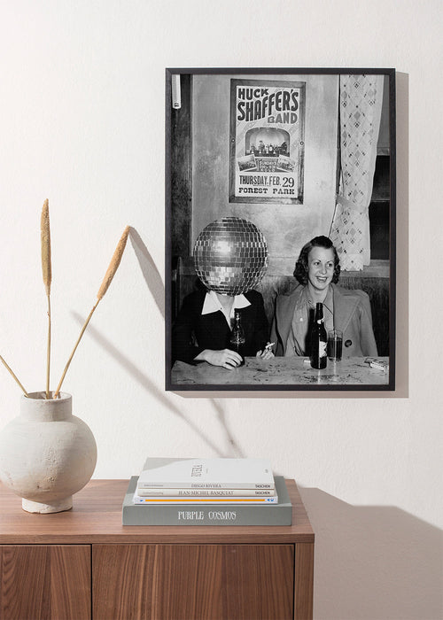 Vintagefoto van stel met discobal-hoofd