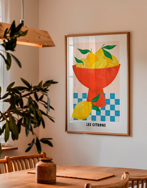 Keuken kunst: citroenen in rode kom