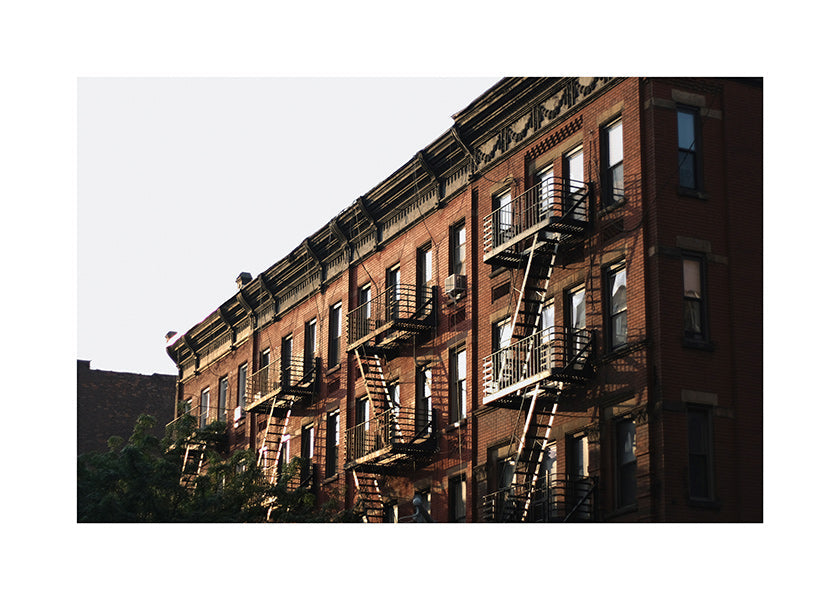 Reisposter: New York brownstone-gevel met brandtrappen