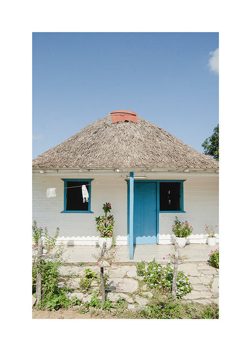 Landschap kunst: huisje met blauwe deur