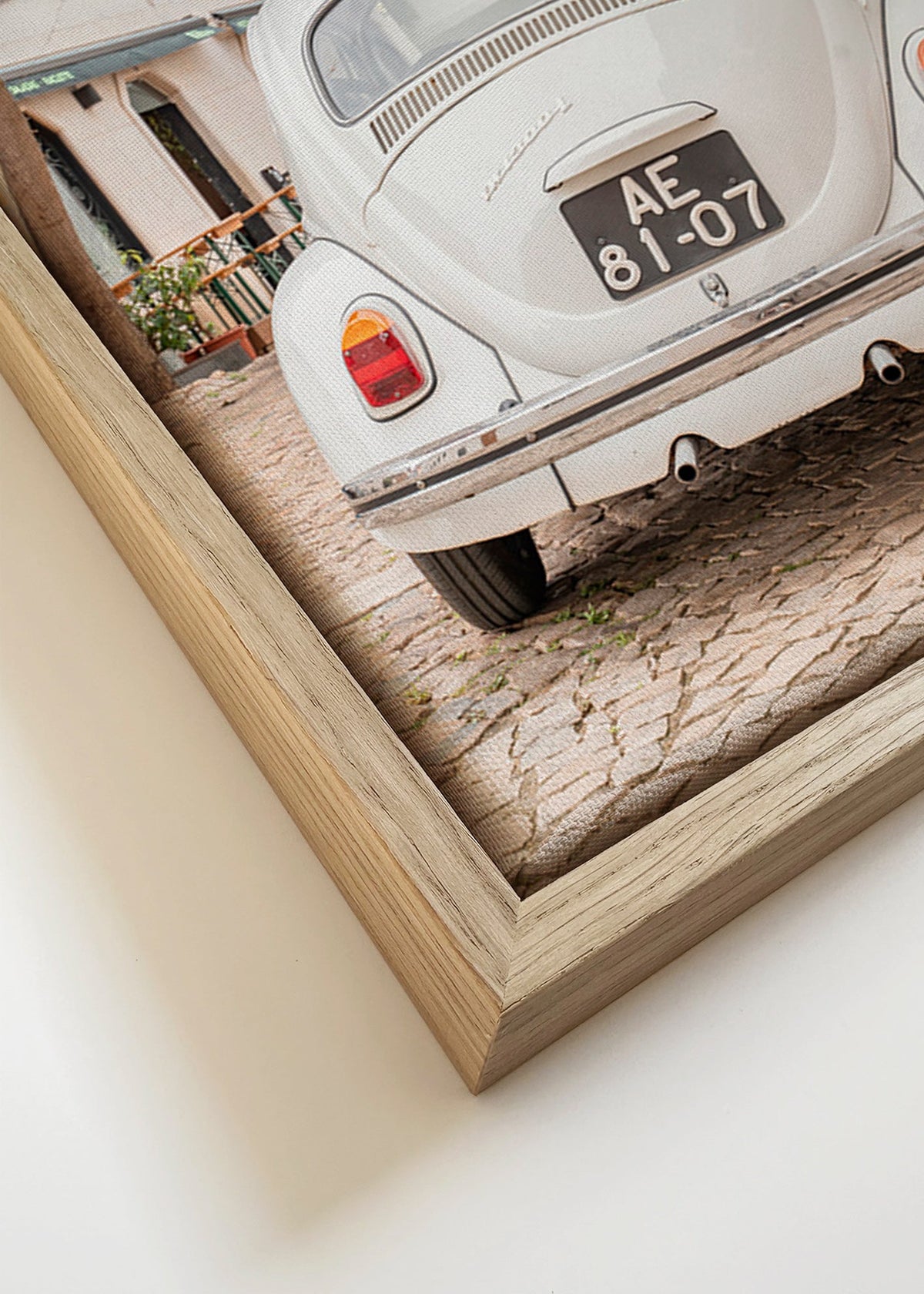 Stadsposter klassieke auto op kasseien – Canvas detail