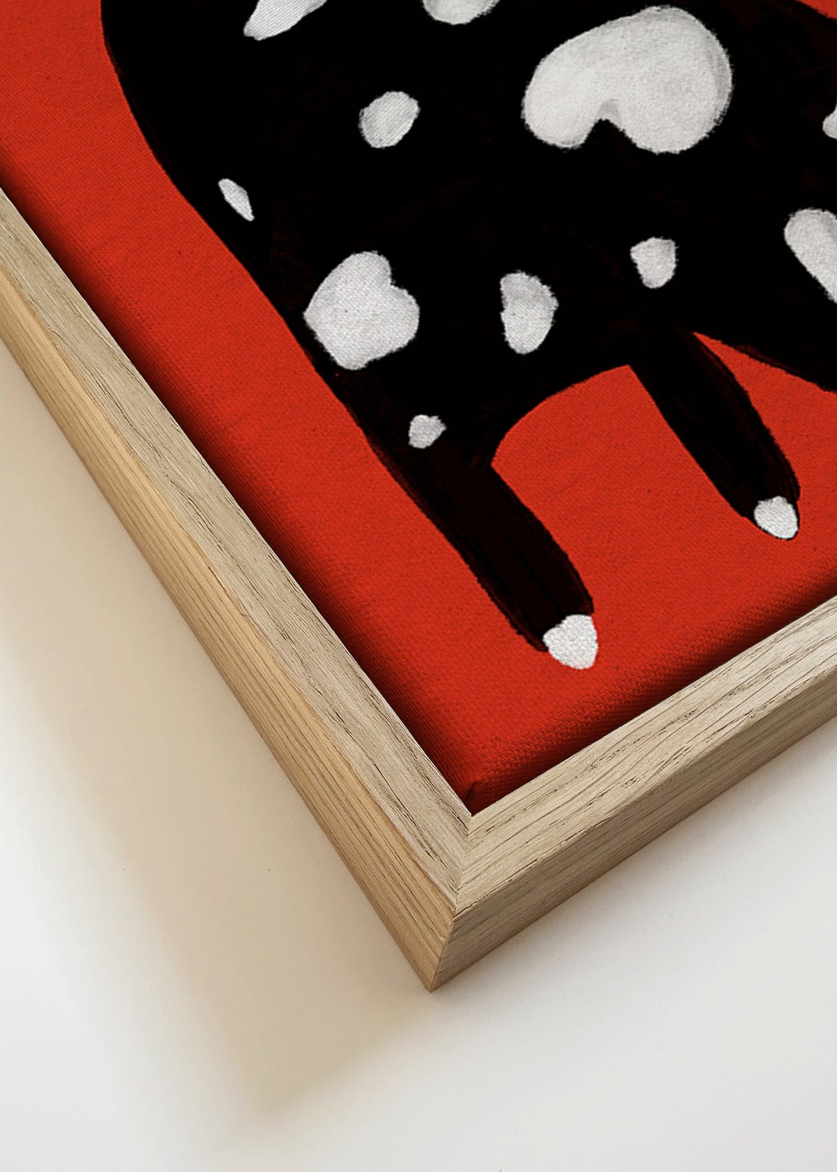 Kat met vlekken op rode achtergrond – Canvas detail