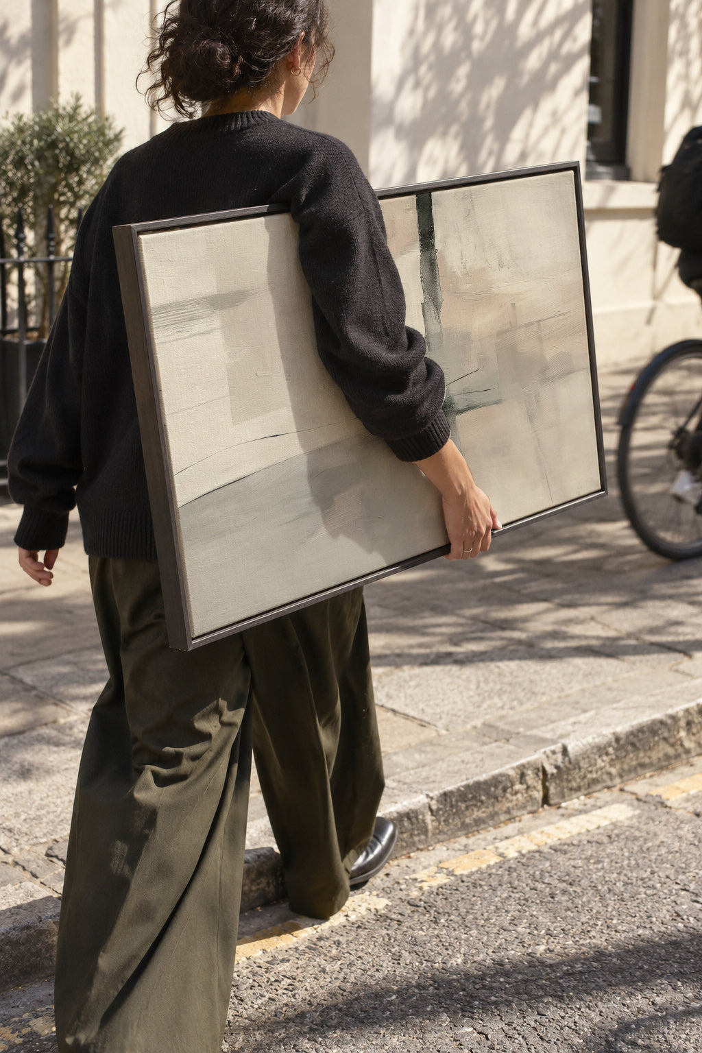 Encounter in Grey - Framed canvas in an interior