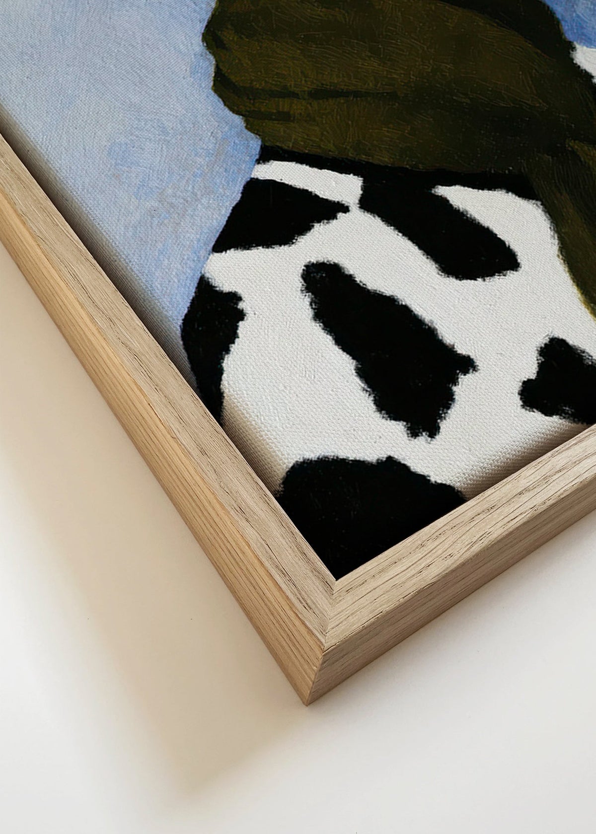 Portretillustratie met koeienpatroon – Canvas detail