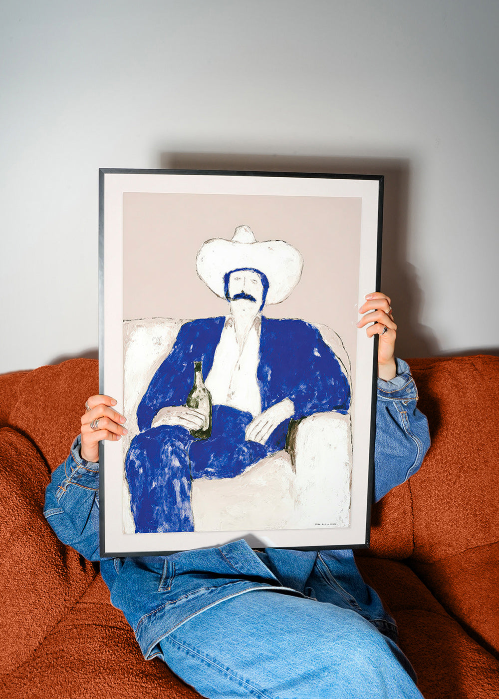 Illustratie van zittende blauwe cowboy