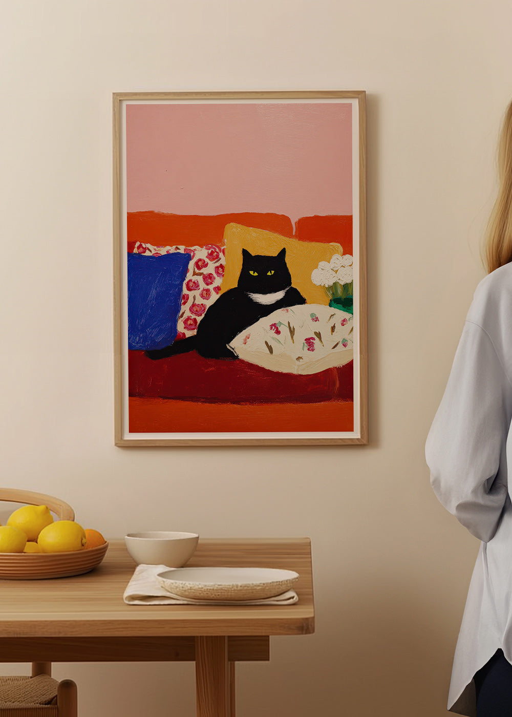 Kunstwerk zwarte kat op kleurrijke bank