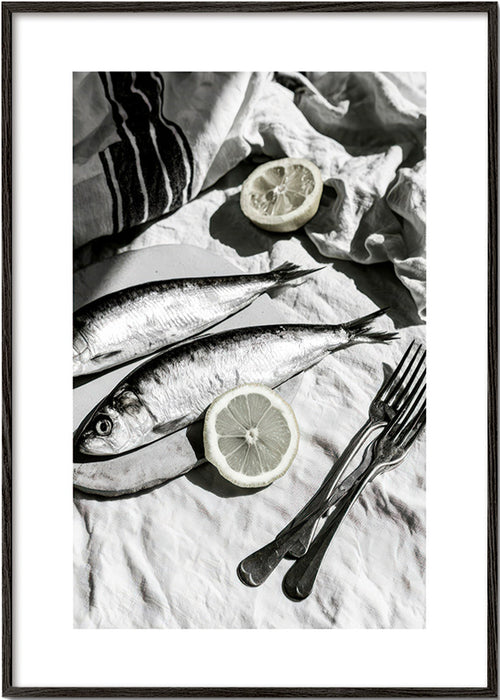 Keuken kunst: monochrome sardines en citroen stilleven