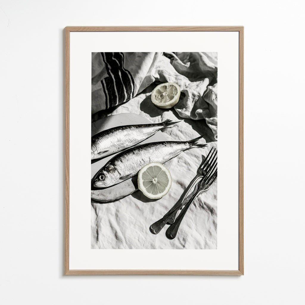Keuken kunst: monochrome sardines en citroen stilleven