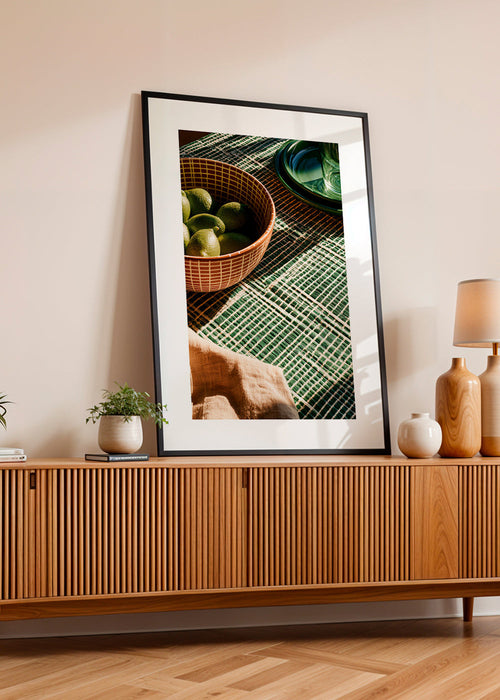 Keuken kunst met limoenen in kom en grafische doek